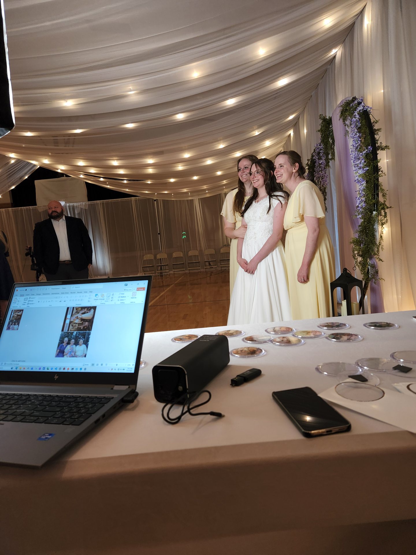 Bride and friends taking a picture at the BSS keepsake station