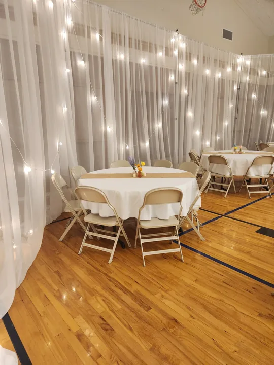 A closer view of the draping and reception table details.