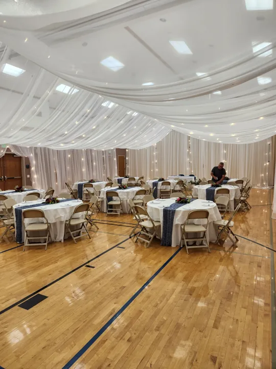 Another view of the draped Utah reception and lighting.